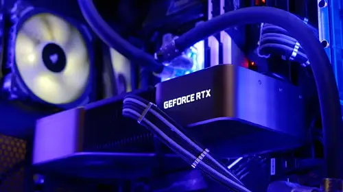 assets/Nvidia-GeForce-RTX-GPU-graphics-card-in-purple-glowing-desktop-PC.jpeg