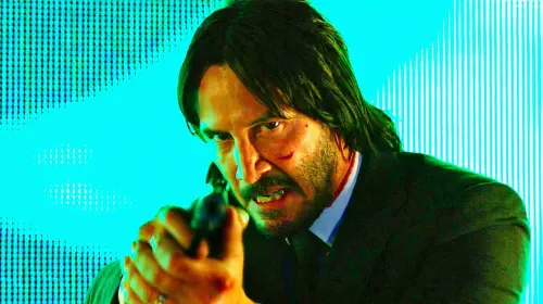 assets/keanu-reeves-points-a-pistol-in-john-wick-chapter-2-1.jpeg