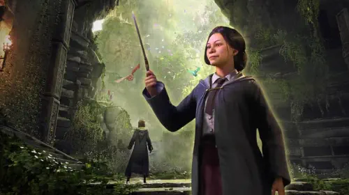 assets/hogwarts-legacy-student-holding-up-a-wand-in-front-of-an-image-from-hogwarts-legacy-with-magical-creatures.jpeg