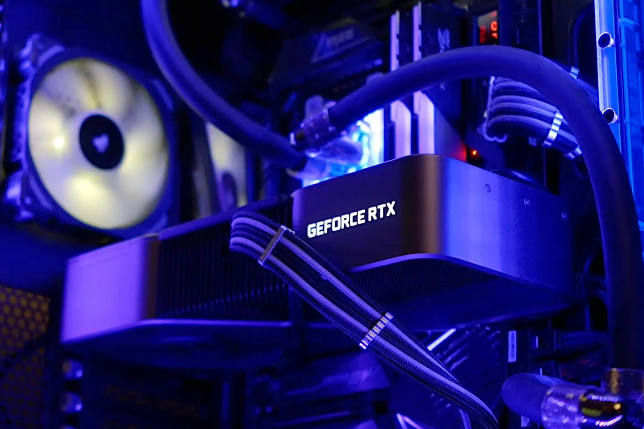 Nvidia-GeForce-RTX-GPU-graphics-card-in-purple-glowing-desktop-PC