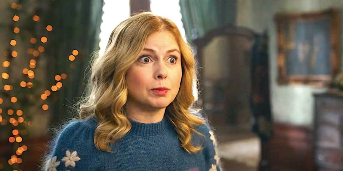 rose-mciver-s-sam-looking-panicked-in-a-christmas-sweater-from-ghosts-season-4