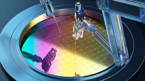 assets/107395321-1712019644063-gettyimages-1677544360-robotarm-semiconductor-1.jpeg
