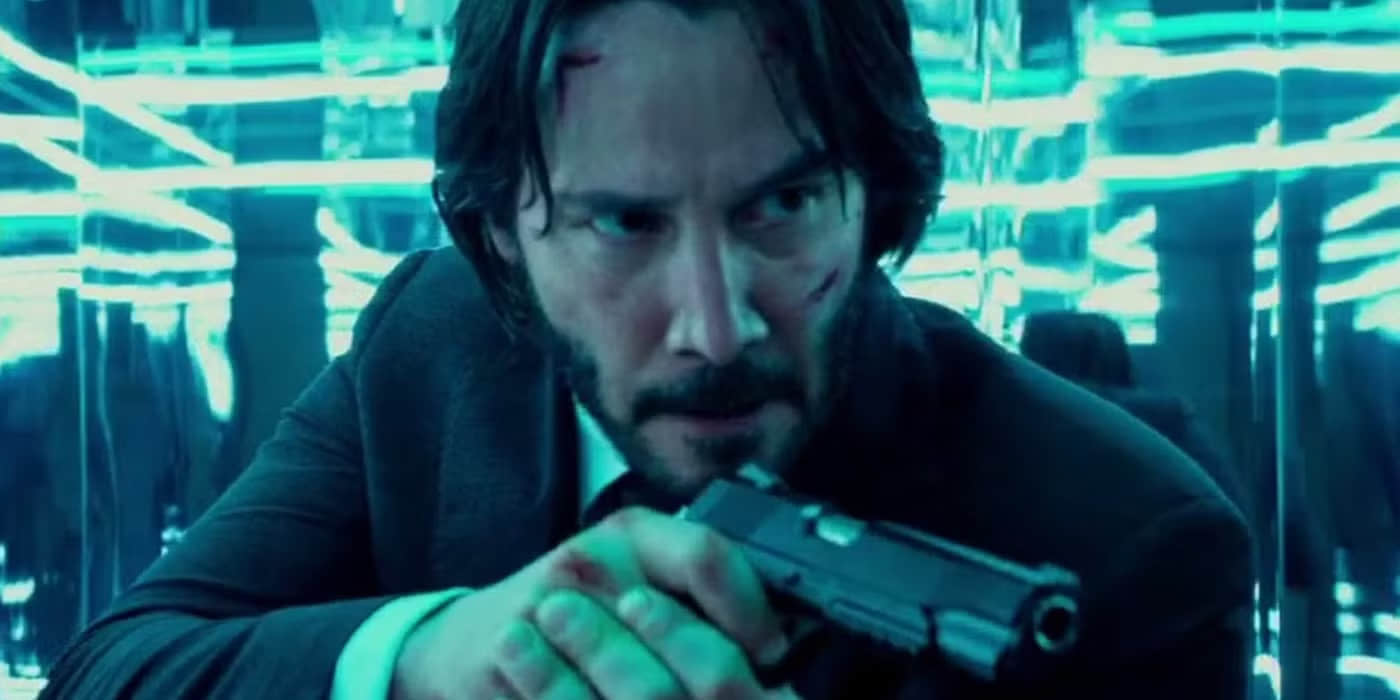 keanu-reeves-pointing-a-gun-in-the-mirror-maze-in-john-wick-chapter-2-1