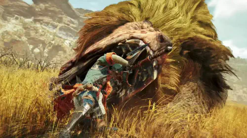 assets/a-doshaguma-lunging-at-a-player-character-mouth-wide-open-in-monster-hunter-wilds.jpeg