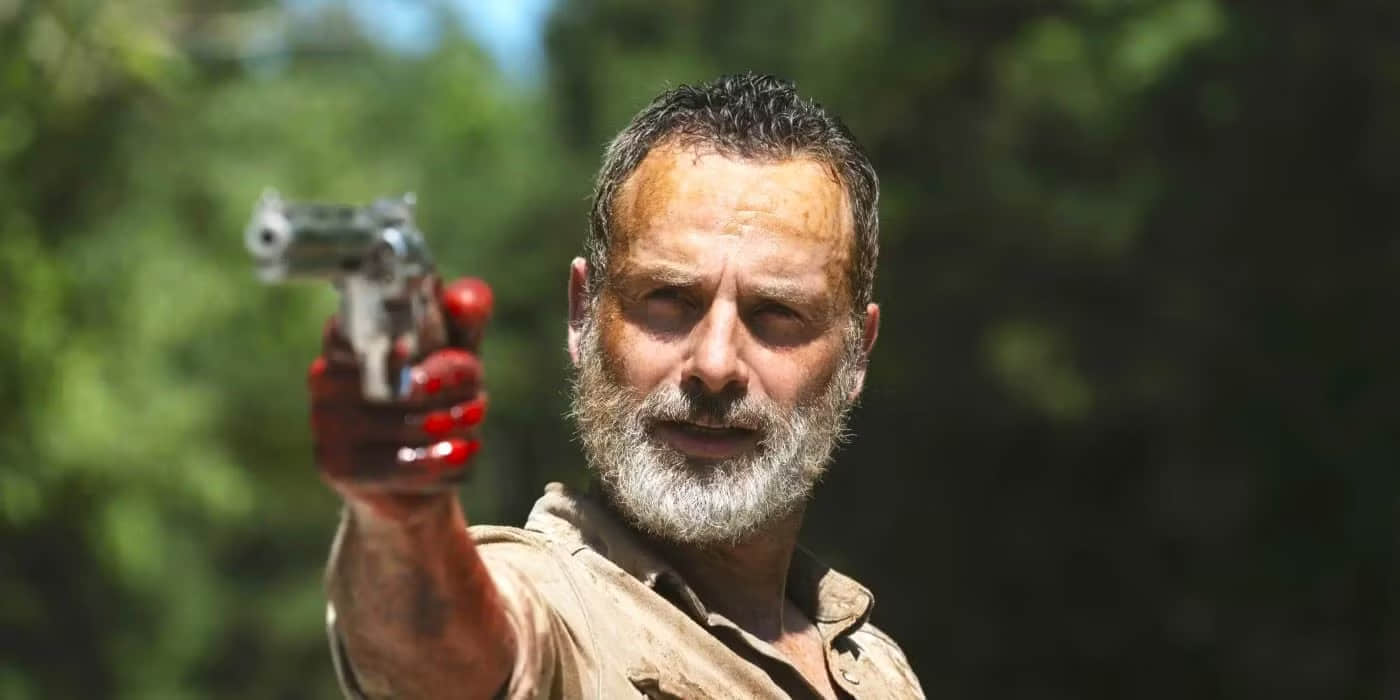 rick-grimes-with-a-bloody-hand-aiming-his-gun-in-the-walking-dead-season-9-episode-5