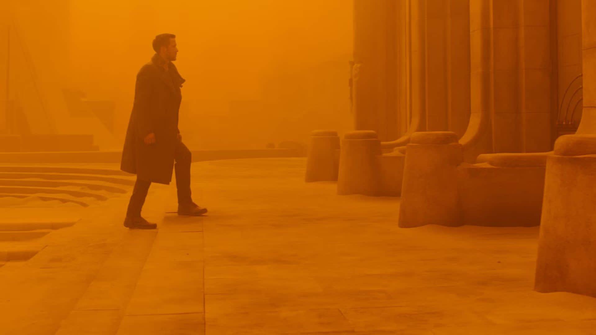 ryan-gosling-walking-up-stairs-in-blade-runner-2049