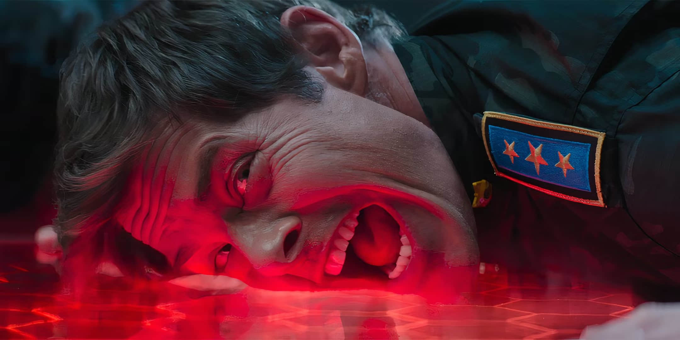 james-marsden-as-tom-screaming-while-held-down-to-the-floor-in-sonic-the-hedgehog-3