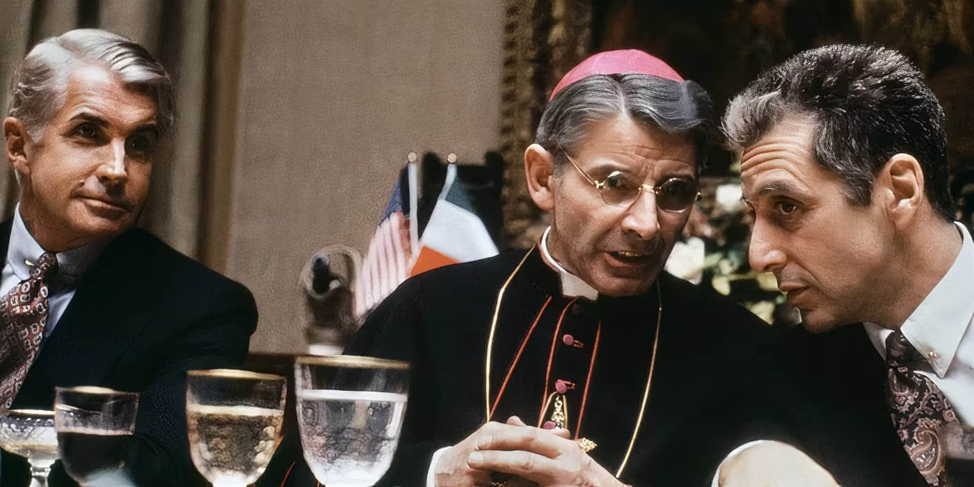 bj-harrison-looking-at-michael-corleone-talking-to-a-vatican-member-in-the-godfather-3