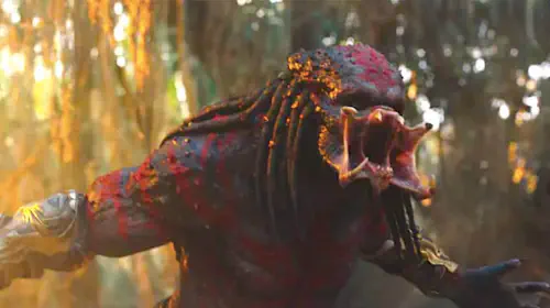 assets/a-predator-roars-in-a-forest-from-the-predator-2018.jpeg