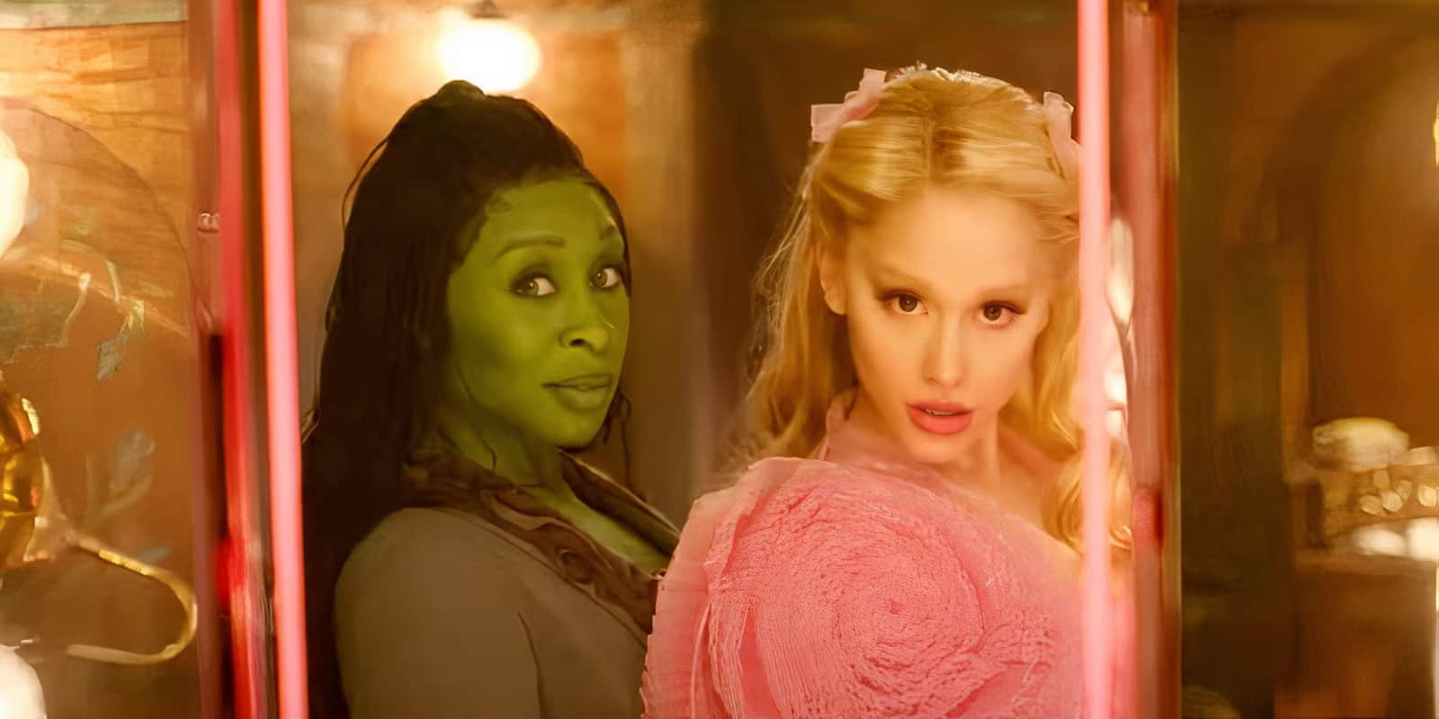 glinda-and-elphaba-looking-at-themselves-in-the-mirror-in-wicked