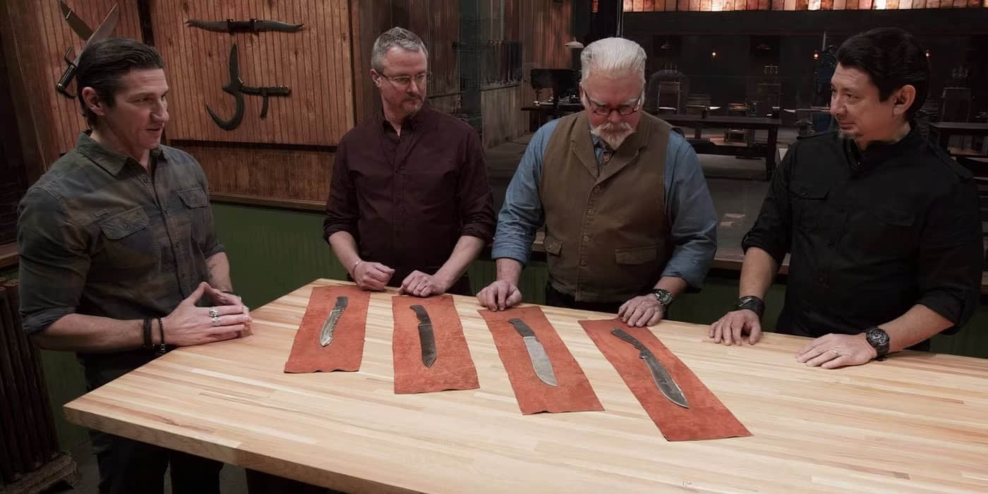wil-willis-and-the-judges-looking-at-knives-on-a-table-on-forged-in-fire