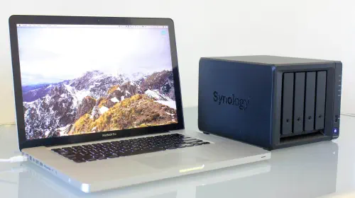 assets/MacBook-Pro-next-to-Synology-NAS-drive-1.jpeg