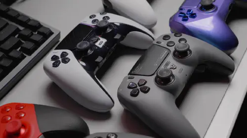 assets/Array-of-wireless-gaming-controllers-next-to-keyboard-on-desk-hero.jpeg