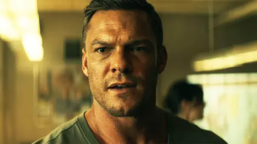 assets/alan-ritchson-as-jack-reacher-looking-worried.jpeg
