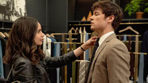 assets/sofia-carson-adjusts-kyle-allen-s-tie-in-the-2025-netflix-movie-the-life-list.jpeg