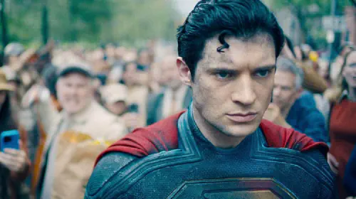 assets/david-corenswet-as-superman-among-crowd.jpeg