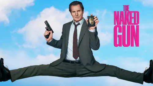 assets/liam-neeson-does-the-splits-and-holds-his-badge-with-clouds-behind-him-in-the-naked-gun-movie-of-2025.jpeg