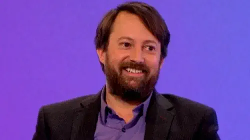 assets/david-mitchell-in-purple-in-the-british-panel-show-would-i-lie-to-you-on-bbc.jpeg