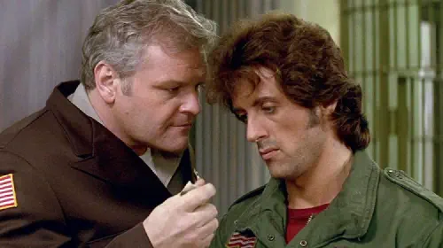assets/sylvester-stallone-as-rambo-and-brian-dennehy-as-will-teasle-in-first-blood.jpeg