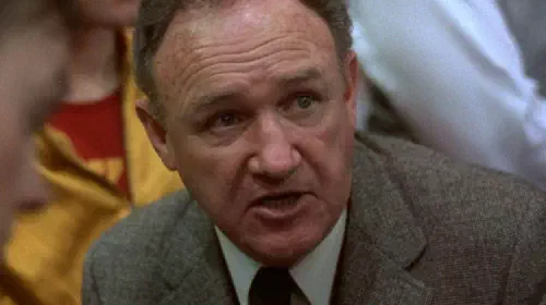 assets/gene-hackman-in-a-huddle-in-the-movie-hoosiers.jpeg