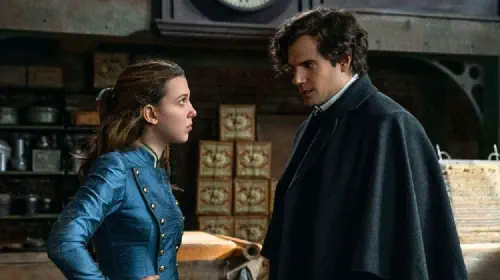 assets/millie-bobby-brown-and-henry-cavill-in-enola-holmes-2.jpeg
