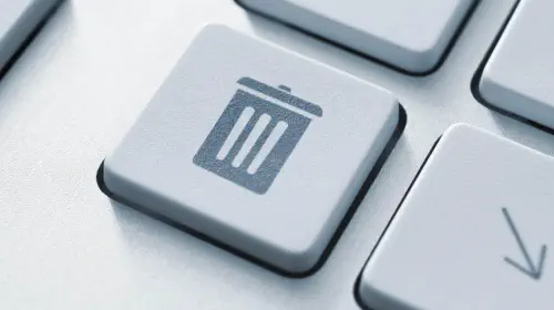 assets/Delete-Trash-button-on-a-white-keyboard-close-up.jpeg