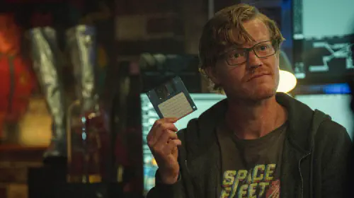 assets/jesse-plemons-as-robert-daly-holding-a-floppy-disk-in-uss-callister-into-infinity-on-black-mirror.jpeg