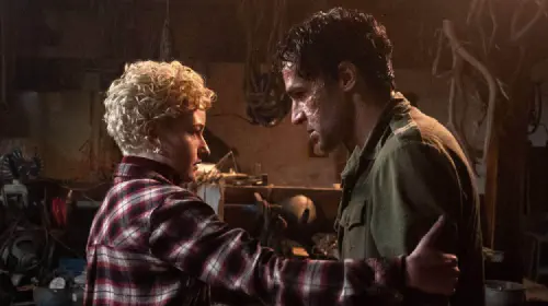 assets/christopher-abbott-and-julia-garner-in-wolf-man-1.jpeg