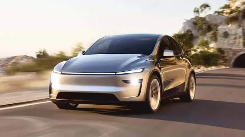 assets/Tesla-1.jpeg