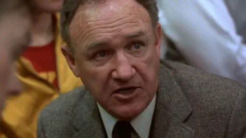 assets/gene-hackman-in-a-huddle-in-the-movie-hoosiers.jpeg