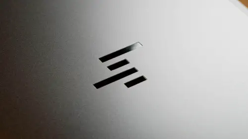 assets/HP-logo-glossy-shining-on-closed-laptop-lid.jpeg