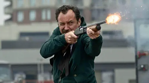 assets/jude-law-shooting-a-shotgun-in-the-order.jpeg