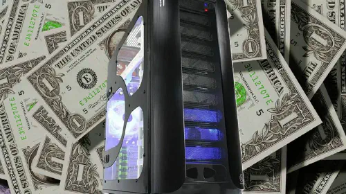 assets/PC-desktop-on-top-of-money-1.jpeg