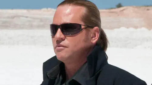 assets/val-kilmer-macgruber-041525-b7bb3e1333744ed68e1a6ad3f2bcb56d.jpeg