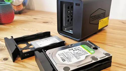 assets/TerraMaster-F2-212-NAS-with-exposed-drive-bays-1.jpeg