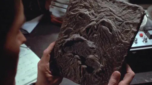assets/ash-holds-the-necronomicon-in-evil-dead.jpeg