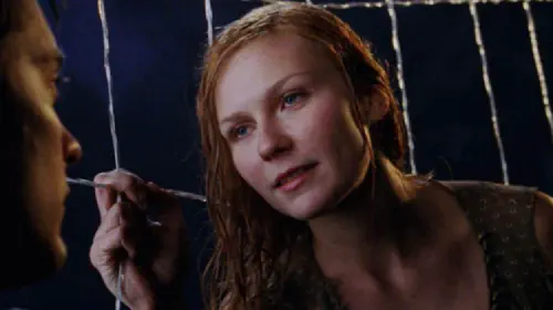 assets/kirsten-dunst-in-a-web-in-spider-man-with-tobey-maguire.jpeg