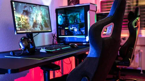 assets/Gaming-chair-at-a-desk-with-gaming-desktop-PC-rig-and-lots-of-RGB-colors-2.jpeg