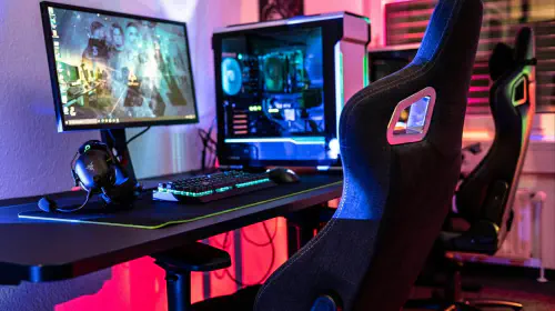 assets/Gaming-chair-at-a-desk-with-gaming-desktop-PC-rig-and-lots-of-RGB-colors-2.jpeg