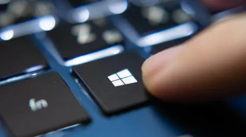 assets/Closeup-finger-pressing-Windows-key-on-laptop-keyboard.jpeg