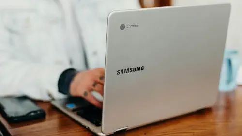 assets/Samsung-Chromebook-laptop-being-used-on-wooden-desk.jpeg