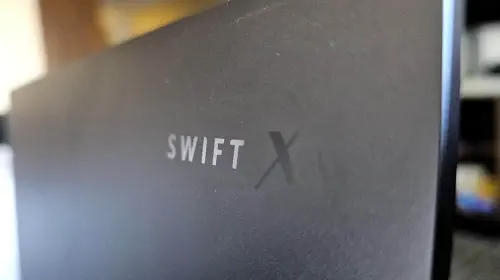 assets/Acer-Swift-X-logo-back-of-laptop-1.jpeg