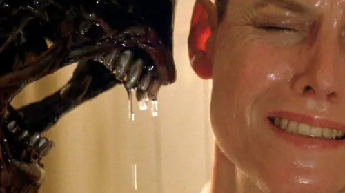 assets/sigourney-weaver-as-ellen-ripley-in-alien-3-next-to-the-xenomorph.jpeg