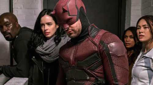 assets/charlie-cox-mike-colter-and-krysten-ritter-in-the-defenders.jpeg