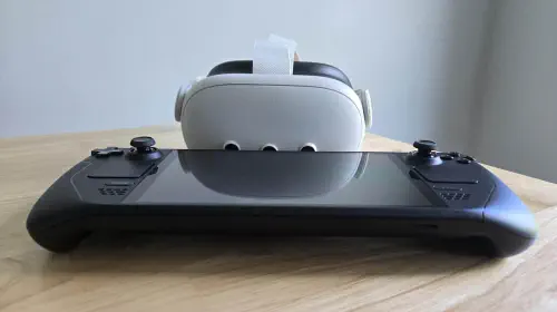 assets/Meta-Quest-3-VR-headset-and-Steam-Deck-on-table.jpeg