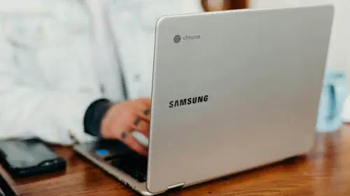 assets/Samsung-Chromebook-laptop-being-used-on-wooden-desk.jpeg