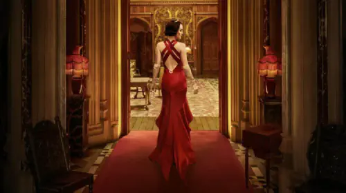 assets/a-woman-in-a-red-dress-walks-through-downton-abbey-the-grand-finale.jpeg