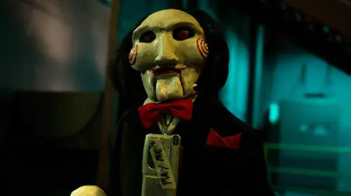 assets/billy-the-puppet-in-saw.jpeg