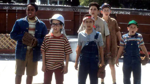 assets/a-group-of-kids-look-shocked-in-the-sandlot.jpeg