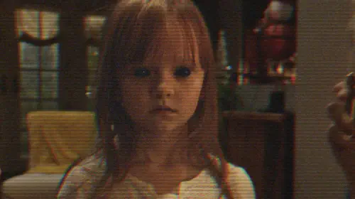 assets/creepy-girl-in-paranormal-activity-the-ghost-dimension.jpeg